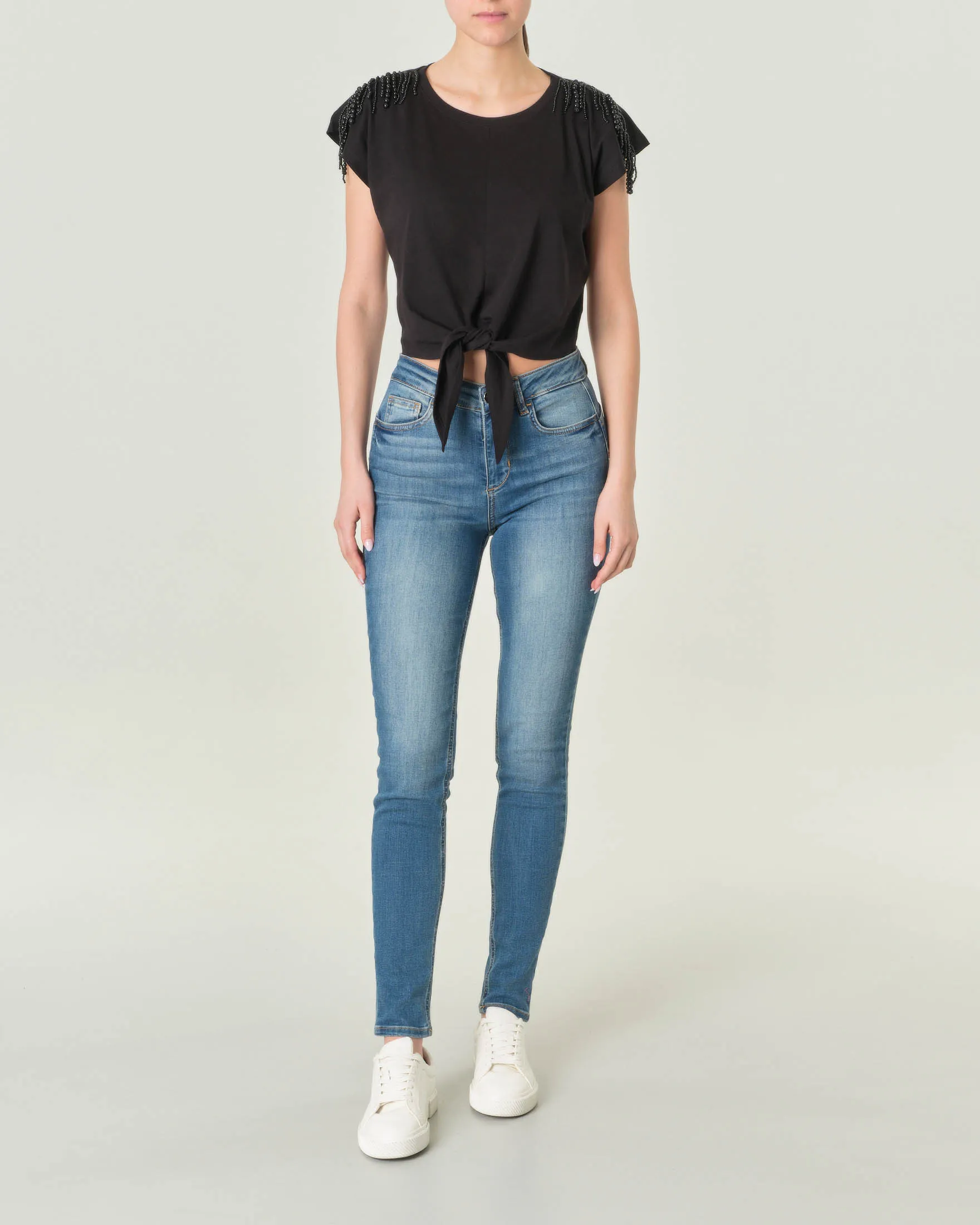 Jeans skinny in cotone strech blu stone washed con schiariture lungo le gambe