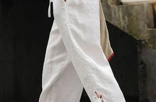 Pantalone elegante in cotone con pizzo, bianco